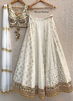 Ivory Hand Embroidered Mirror Work Blouse With Ivory Kali Lehenga And Layered Tassel Dupatta Lehenga Shrena Hirawat Luxury White Kundan Dupatta, Luxury Traditional Tops With Dupatta, Luxury Off White Cutdana Dupatta, Luxury Lehenga With Tassels For Women, Luxury White Dupatta For Festive Occasions, Luxury Embellished White Dupatta, Luxury Traditional Off White Dupatta, Luxury Traditional Off-white Dupatta, Luxury Shantoon Dupatta With Mirror Work