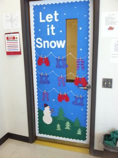 a door decorated with clothes and snowman on the outside, says let it snow