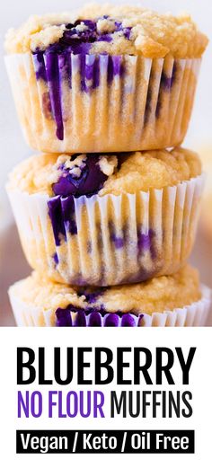 three blueberry muffins stacked on top of each other