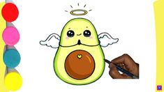 an avocado with angel wings on its face is surrounded by colored markers and pencils