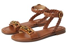 MICHAEL Michael Kors Kailey Flat Sandal - Women's Sandals : Luggage : Stay comfortable for hours wearing the stylish MICHAEL Michael Kors Kailey Flat Sandals. Synthetic upper, lining, and insole. Slip-on style. Goldtone chunky chain detail on the strap. Flat silhouette and an open toe. Braid detail on the ankle strap for an enhanced look. Adjustable ankle strap with buckle closure. Rubber outsole with high traction and durability. Imported. Measurements: Heel Height: 1 2 in Weight: 11 oz Product Vacation Sandals With Chain Strap And Round Toe, Vacation Sandals With Chain Strap, Flat Sandals With Chain Strap And Synthetic Material, Open Toe Sandals With Chain Strap, Casual Sandals With Chain Strap And Round Toe, Synthetic Sandals With Chain Strap For Vacation, Vacation Sandals With Chain Strap And Synthetic Material, Casual Sandals With Chain Strap For Vacation, Open Toe Synthetic Sandals With Chain Strap