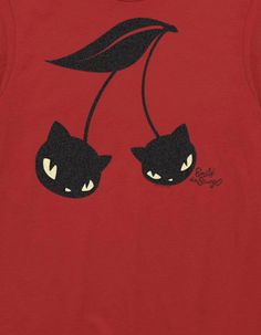 a red t - shirt with two black cats hanging from it's neck and eyes