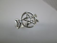 Pentagram ring. Beautifully crafted solid sterling silver PENTAGRAM ring with a crescent moon on either side. Nicely designed 5 pointed star with a circle around it. Face height = 12.5mm. Stamped 925. Pentagram Ring, 5 Pointed Star, 5 Point Star, Crescent Moon Ring, Celestial Ring, Tiny Rings, Moon Ring, 925 Ring, Funky Jewelry