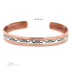 A Native American Handmade Copper And Silver Bracelet with a white enamel band featuring black geometric patterns. The open-ended bracelet showcases "Super Silver" printed on the bottom left Southwest Vibes, Native American Traditions, Handmade Copper, Showcase Design, Handmade Bracelets, Different Styles, Cuff Bracelet, Native American, Nativity