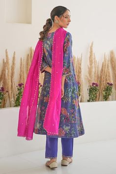 Purple kurta with all over scattered floral blossom prints and placement hand embroidery detailing. Paired with a pant and magenta silk hand embroidered dupatta. - Aza Fashions Chanderi Floral Print Straight Kurta Sets, Unstitched Floral Print Sets For Festivals, Floral Print Mulmul Sets For Festivals, Festive Floral Print Mulmul Sets, Festival Floral Print Mulmul Sets, Floral Print Mulmul Sets With Straight Kurta, Unstitched Festive Floral Print Sets, Festive Unstitched Floral Print Sets, Festive Floral Print Unstitched Sets