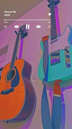 two guitars are hanging on the wall next to each other, one is orange and blue