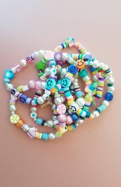 Note: these bracelets are stretchy! These bracelets feature fun and bright colors and beads! Each bracelet design is only made once 💕 Handmade with love 🌈 Bracelet Business Ideas, Ideas Para Hacer Pulseras, Olivia Aesthetic, Beaded Bracelet Stack, Bracelet Business, Rave Accessories, Bracelets Design, Neon Rainbow, Bracelet Design