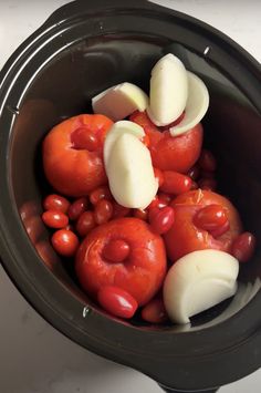 tomatoes and onions are in the slow cooker