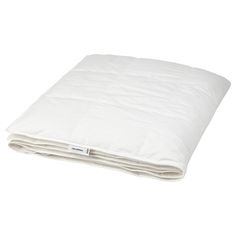 an image of a white comforter on a bed