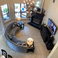 an aerial view of a living room and dining room