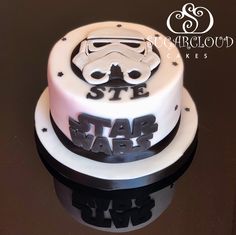 two tiered cake decorated with star wars characters