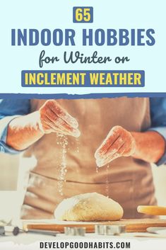 a person in an apron sprinkling flour on top of bread