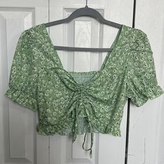 Green Floral Cropped Shirt From Amazon. Drawstring Adjustable Length. Never Worn And In Great Condition. Casual Spring Tops From Amazon, Amazon Casual Spring Tops, Amazon Casual Tops For Spring, Casual Amazon Short Sleeve Top, Casual Amazon Tops For Day Out, Casual Tops For Day Out By Amazon, Amazon Fitted Cotton Tops, Amazon Cotton Tops For Spring, Spring Cotton Tops By Amazon