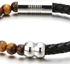 Features: Men Women Bracelet Black Braided Leather and Tiger Eye Stone Leather Beads Bangle Bracelet Wristband Metal: Stainless Steel; Material: Synthetic Tiger Eye and Black Leather Bead Size: 6MM(0.24") Finishing: Polished Dimension: Length Stretchable 19CM(7.48"); Chain Width: 0.6CM(0.24"); Weight: 14.3g Package: Jewelry Box with Brand Name COOLSTEELANDBEYOND Item Condition: New Leather Beaded Bracelets With Round Beads For Gift, Beaded Leather Bracelet As Gift, Brown Leather Beaded Bracelets With Round Beads, Casual Black Leather Beaded Bracelets, Beaded Leather Bracelet - Perfect Gift, Leather Beads, Beaded Bangles Bracelets, Women Bracelet, Bead Bangles