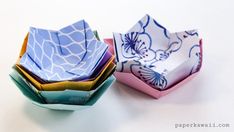 three origami bowls sitting on top of each other