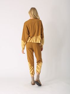 Cozy meets chic with our arid saffron Rylan sweatshirt. Elevate your loungewear game with this soft, stylish essential that features a hand-dyed tie dye, relaxed fit, and raw edge hem. Pair it with our Sunny jogger. to complete the look. Fabric: 70% Pima Cotton, 25% Modal, 5% Spandex. Color-way: Arid (Saffron). Model is 5'9" and wearing size small. Machine wash. Tumble dry on low. Made in the USA. Sweat Sets, Loungewear Sets, Sweaters And Leggings, Lifestyle Shop, New Set, Raw Edge, Pima Cotton, Jacket Tops, Sweater Hoodie