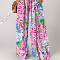 Palm Beach Floral Smock Sleeveless Wide Leg One Piece Pocket Pant Jumpsuit This one-piece boho pant romper is definitely a step above the rest.Bright colorful floral Palm Beach lilly print is anything but basic.Sleeveless wide spaghetti shoulder straps with a super stretchy smocked bodice.Slit side pockets make for functional fashion that's perfect for everyday wear.Comfy style with oversized wide leg trousers that move with you.Easy to add a denim jacket or undershirt for a modern modest contemporary style. Details:Color: Pink, Blue, Green, WhitePattern: FloralSleeve style: Wide SpaghettiSleeves length: SleevelessAdjustable: NoNeckline: SquarePant style: WidePant length: FullPockets: YesStretch: (Bodice) Yes (Pants) NoMaterial: 100% polyesterCare: Machine wash cold. Tumble dry low. Measur Pant Romper, Palm Beach Style, Beach Floral, Functional Fashion, Boho Pants, Floral Jumpsuit, Pocket Pants, Romper Pants, Wide Leg Trousers