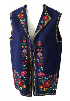 One of a kind Blue wool felt vintage Trachten embroidered floral fringed vest. Unlined. 60s/70s. VG condition-only minor flaw is loose thread on back on neck-shown in last photo. Sold as is. Please see measurements for proper fit. shoulders-15 Length- 25.5 armholes 9 All sales are final. Policies regarding items I sell- PLEASE READ BEFORE YOU BUY! As a long time seller, I source specifically to resell at reasonable prices.  I only select and list great items I feel are in very wearable / and or Sleeveless Outerwear With Floral Embroidery For Spring, Sleeveless Floral Embroidery Spring Outerwear, Sleeveless Spring Outerwear With Floral Embroidery, Sleeveless Floral Embroidered Spring Outerwear, Bohemian Sleeveless Embroidered Outerwear, Vintage Blue Vest For Fall, Folk Style Embroidered Vest, Folk Style Vest With Multicolor Floral Embroidery, Spring Folk Festival Vest