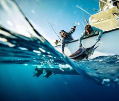 two people on a boat in the ocean