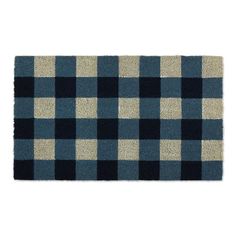 a blue and white checkered rug on a white background