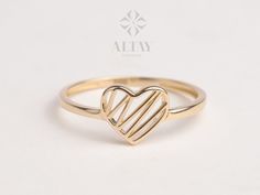 ABOUT PRODUCT This 14K Gold Heart Ring is suitable gift for girlfriend, mom and her. You can even buy as a birthday gift for your friends or anniversary gifts, If you want to add a special note we can write for you and put to inside of package. We manufacture our jewelry pieces with carefully and after production we double checking in quality control department. Our main idea is keep our items for daily wearing especially for minimalist jewelry pieces. Minimalist heart ring, Heart ring, Love rin Yellow Gold Rings For Anniversary On Valentine's Day, Yellow Gold Rings For Valentine's Day Anniversary, White 14k Gold Heart Ring As Gift, White Gold Heart Ring For Valentine's Day Anniversary, Gold Heart Cut Ring For Anniversary, 14k Gold Heart Ring For Wedding On Mother's Day, Gold Heart Ring For Valentine's Day Anniversary, Valentine's Day Gift Open Heart Rings, Heart Shaped Ring For Anniversary On Mother's Day