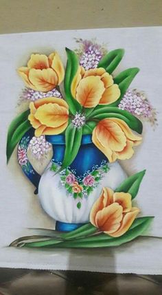 a painting of yellow flowers in a blue vase