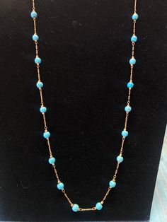 Add A Touch Of Western Style To Any Outfit With This Beautiful Turquoise Necklace! Turquoise Beads Gold Colored Chain Claw Closure Light Blue Single Strand Jewelry For Jewelry Making, Turquoise Necklace With Lobster Clasp And Round Beads, Adjustable Blue Beaded Turquoise Necklace, Turquoise Long Beaded Chain Necklace, Elegant Blue Turquoise Necklace With Lobster Clasp, Elegant Turquoise Wire Wrapped Beaded Necklace, Elegant Blue Turquoise Necklace, Turquoise Beaded Chain Necklace Gift, Blue Beaded Chain Turquoise Necklace As Gift