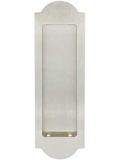 an image of a stainless steel door handle on a white wall mounted cabinet or cupboard