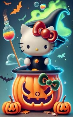 a hello kitty sitting on top of a pumpkin