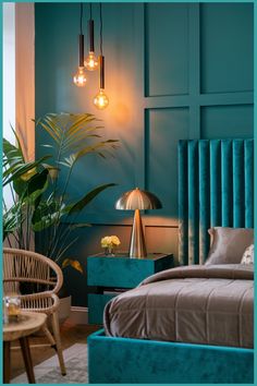 Modern bedroom with teal walls and decor, featuring a velvet headboard, hanging lights, and houseplants. Curtains For Teal Walls, Peacock Teal Bedroom, Teal Room Aesthetic, Teal Room Ideas, Teal Color Palette Bedroom, Teal And Copper Bedroom, Teal Interior Design, Turquoise Bedroom Walls