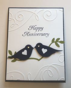 an anniversary card with two birds on a branch