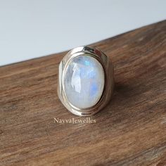 Rainbow Moonstone Oval 925 Sterling Silver Handmade Women Ring, Rainbow Moonstone Silver Ring, Gift for her, Boho Gemstone Ring Ring Style> Statement Ring / Dainty Ring, Stackable Ring / Minimalist Rings Gemstone Type> Rainbow Moonstone  Gemstone Shape> Oval Metal> 925 Sterling Silver Ring Size> All Size is Available Ring For Women >Benefits of wearing silver:- Wearing silver jewelry is proved in fighting infection and preventing yourself from cold and flu, and many kinds of bacteria and viruses Hallmarked Oval Moonstone Ring, Oval Hallmarked Moonstone Ring, Untreated Oval Silver Moonstone Ring, Handmade Oval Moonstone Ring For Anniversary, Unique Untreated Oval Moonstone Ring, Oval Untreated Moonstone Ring For Anniversary, Untreated Oval Moonstone Ring For Anniversary, Rings Gemstone, Zierlicher Ring