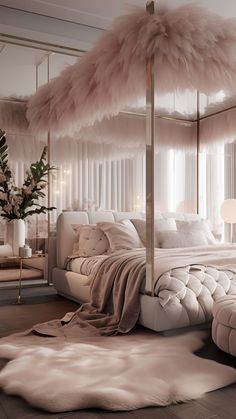 a bedroom with a canopy bed and pink feathers on the headboard, along with white furniture