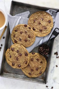 chocolate chip cookies and coffee on a tray