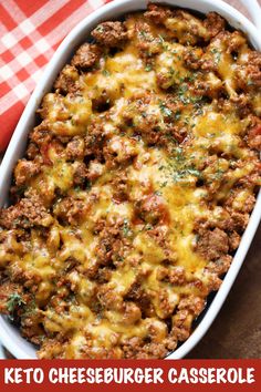 keto cheeseburger casserole in a white dish on a red and white checkered tablecloth