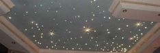 the ceiling is decorated with stars and lights