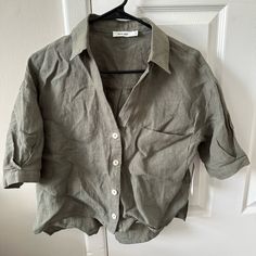 From Magnolia Market In Waco, Tx. Never Worn. Brand New With Tags! Runs Small Since It Is A True Linen With No Stretch. If You Have Larger Arms, The Arms May Be A Bit Snug On You. Buttons Are A Marbled Off White. Super Lightweight And The V-Neck Is Rather Low So A Tank Or Bralette Is Needed. Sage Green Color. If You’re Typically A Small I Think This Would Fit Great! I’m 5’3’’, 160 Pounds And Found The Arms To Be A Bit Snug On Me But The Torso Fit Great. Vintage Linen Button-up Tops, Green Cotton Button-up Tops, Linen Button-up Tops With Patch Pockets, Relaxed Fit Rayon Button-up Tops, Olive Cotton Button-up Top, 160 Pounds, Linen Short Sleeve, Sage Green Color, Magnolia Market