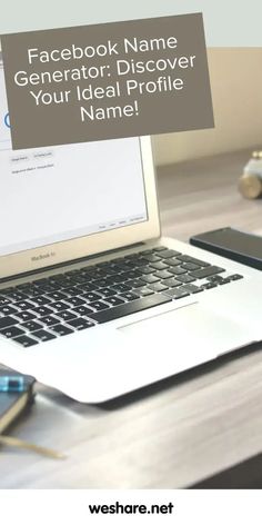 a laptop computer sitting on top of a desk next to a cell phone and pen