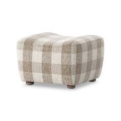 the footstool is made out of fabric and has a checkered pattern on it