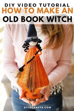 a woman holding an old book witch with text overlay that reads diy video tutor how to make an old book witch