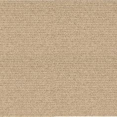 a beige area rug with small squares on it