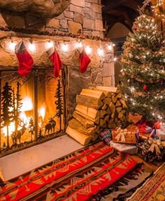 a fireplace decorated with christmas decorations and presents