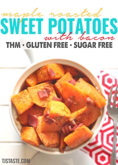 a white bowl filled with sweet potatoes on top of a table