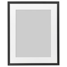 an empty black and white frame on a wall