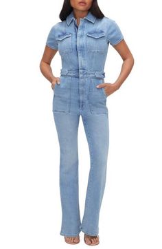 Feel powerful in this stretch-denim jumpsuit with snaps at the waist for a defined look and lots of handy pockets to keep you feeling organized. 56" regular length; 29" inseam; 18" leg opening (size Medium) Front half-zip closure Spread collar Short sleeves Chest flap-patch pockets; front patch pockets; back patch pockets Snap side tabs 72% cotton, 25% recycled cotton, 2% elasterell-p, 1% elastane Machine wash, tumble dry Imported Black Owned/Founded Fitted Cotton Utility Denim Jumpsuit, Fitted Cotton Denim Utility Jumpsuit, Fitted Utility Overalls With Pockets, High Rise Denim Jumpsuit With Pockets In Utility Style, Fitted High Waist Denim Jumpsuit In Utility Style, Fitted High Waist Denim Utility Jumpsuit, Fitted High-waist Denim Utility Jumpsuit, Utility Cotton Denim Jumpsuit With Belt Loops, Utility Style Cotton Denim Jumpsuit With Belt Loops