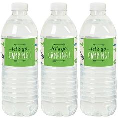 three bottles of water with labels on them