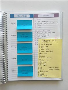 a spiral notebook with sticky notes attached to it and the words mother list written in blue