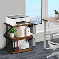 a computer desk with a printer on top of it