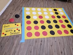 a bulletin board with polka dots on it next to a sign that says get connected with jesus