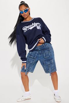 Available In Navy. V-Neck Sweatshirt Long Sleeve Front Screen Embroidered Disclaimer: Due To The Embroidery Placement, Each Garment Is Unique 100% Polyester Imported | Brooklyn 1980 Athletic Sweatshirt in Navy Blue size XS by Fashion Nova Casual V-neck College Sweatshirt, Varsity Tops With Embroidered Graphics And Relaxed Fit, Blue Varsity Tops For Spring, Blue Varsity Style Tops, Blue Top With Embroidered Text For Streetwear, Blue Tops With Embroidered Text For Streetwear, Varsity Tops With Embroidered Graphics, Casual Blue Top With Embroidered Text, Blue Embroidered Text Streetwear Tops